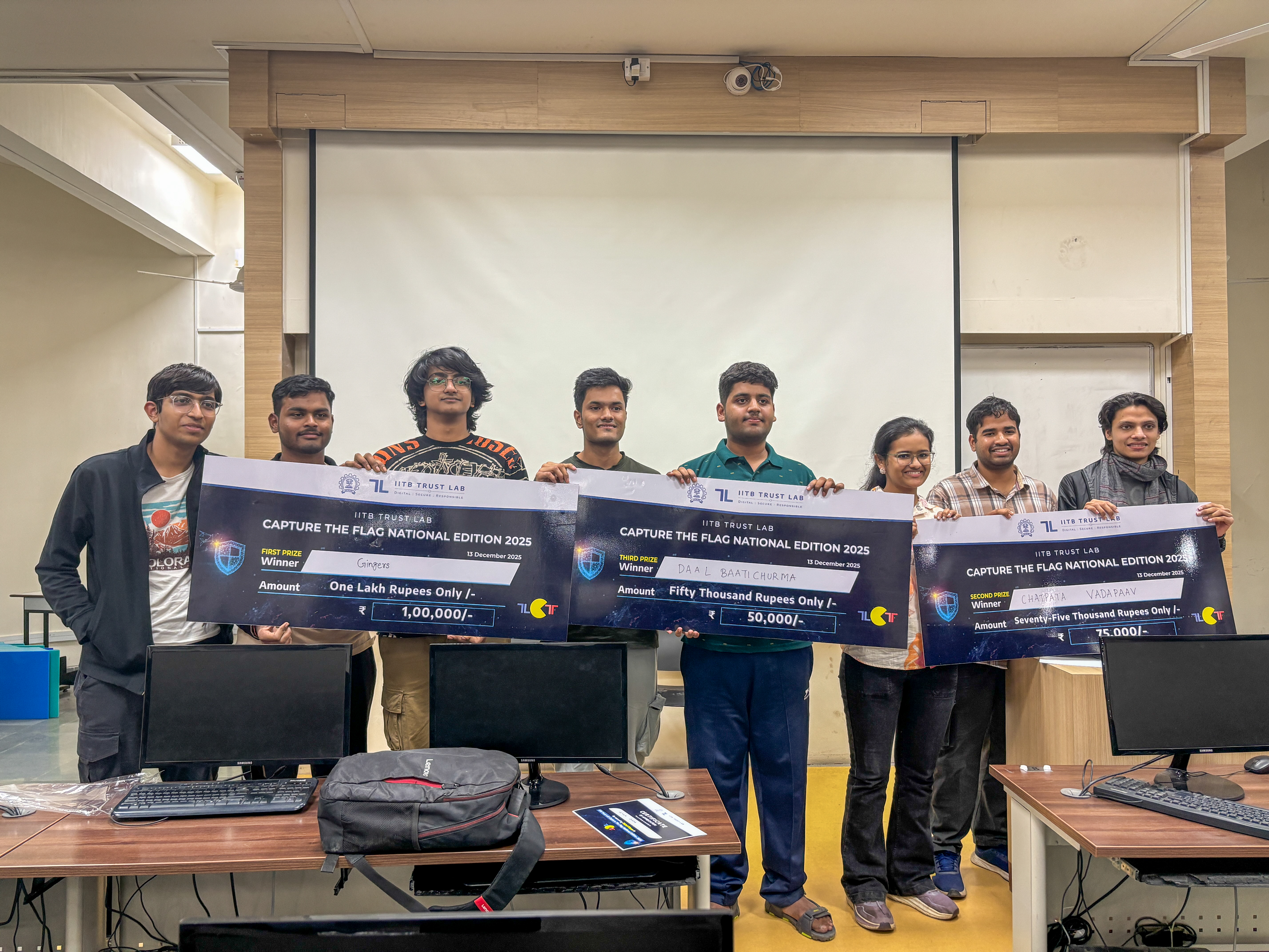 Mumbai, India: December 16, 2025: IIT Bombay’s Trust Lab successfully concluded the grand finale of its national-level cybersecurity competition Capture The Flag (CTF) today at its Powai campus. The event brought together some of India’s most promising young cybersecurity minds for a full-day challenge designed to mirror real-world digital threat scenarios.
A Capture The Flag (CTF) is a cybersecurity competition where participants solve challenges to find “flags,” special strings serving as proof-of-hack. It tests skills across cryptography, reverse engineering, web security, forensics, and networking. Players analyse vulnerable programs or services, identify weaknesses, and submit the flags for points. In the IITB Trust Lab CTF, challenges covered Cryptography, Web Exploitation, Reverse Engineering, and Miscellaneous categories.
This initiative by IIT Bombay’s Trust Lab comes at a time when the demand for cybersecurity talent in India is rising sharply, even as nearly 50% of cybersecurity jobs reportedly remain unfilled—reflecting an urgent need to strengthen the country’s talent pipeline.
The competition drew 480 teams from top engineering institutes, cybersecurity clubs, and technology universities across India. Participants competed individually or in teams of two. From this pool, the top 50 finalists were shortlisted for the on-campus finale, where they undertook a series of escalating technical challenges developed by cybersecurity researchers from Trust Lab.
Prof. Shireesh Kedare, Director of IIT Bombay, said, “CTF competitions are globally accepted as one of the most effective ways to build hands-on cybersecurity capability. Participants are required to solve challenges across domains such as reverse engineering, cryptography, application security, digital forensics and system exploitation—the skills crucial for combating online scams, financial fraud, phishing, ransomware, and emerging digital risks targeting individuals and institutions,” adding, “With India’s digital footprint expanding rapidly—from UPI and fintech to smart infrastructure and AI-powered services—the demand for skilled cybersecurity professionals has never been higher. IIT Bombay’s Trust Lab aims to nurture this talent through competitions, workshops, research collaborations, and real-world testing platforms.”
At the conclusion of the competition, the first place was secured by Team ‘Gingers’, followed by Team ‘Chatpata Vada Paav’ in the second place and Team ‘Daalbaatichurma’ in the third place, with all three teams representing IIT Roorkee. The fourth place was awarded to Team ‘fl4g0rD13’ from IIT Madras, while the fifth place went to Team ‘Deathwing’ from Vishwakarma Institute of Technology, Pune.
In addition, Shriyansh Gupta from Team ‘JEE is Tuff’ received a special mention for his exceptional performance. Notably, Shriyansh is an 11th standard student from Kendriya Vidyalaya Delhi, who competed alongside undergraduate students from some of India’s leading technical institutions.
Prof. G. Sivakumar, Principal Investigator of IIT Bombay’s Trust Lab, said, “Competitions like this are crucial for closing the gap between academic learning and the rapidly evolving threats confronted by industry. They force participants to think like real adversaries, apply core technical principles under pressure, and build the instincts that modern cybersecurity demands. The CTF finale also immersed students in IIT Bombay’s advanced cybersecurity research ecosystem—offering direct interactions with faculty, exposure to cutting-edge defence frameworks, and insights into the latest global attack techniques.”
Mr. Mukul Joshi, Program Director of IIT Bombay’s Trust Lab, said, “While Trust Lab has been fostering a community and culture of cybersecurity among students through CTFs, we are also witnessing growing interest from industry to conduct similar challenges for their employees. IIT Bombay’s Trust Lab has successfully collaborated with industry partners in the past and will continue to leverage this platform to enhance the skills of working professionals as well.”
Trust Lab has been a trailblazer in shaping India’s CTF culture. At a time when cybersecurity competitions were still emerging in the country, Trust Lab launched one of India’s earliest large-scale national CTFs, attracting exceptional talent from premier institutes. As one of the first institutions to actively sponsor and champion CTF initiatives, Trust Lab has played a pivotal role in nurturing the next generation of cybersecurity professionals and catalysing a competitive ecosystem that continues to strengthen year after year.